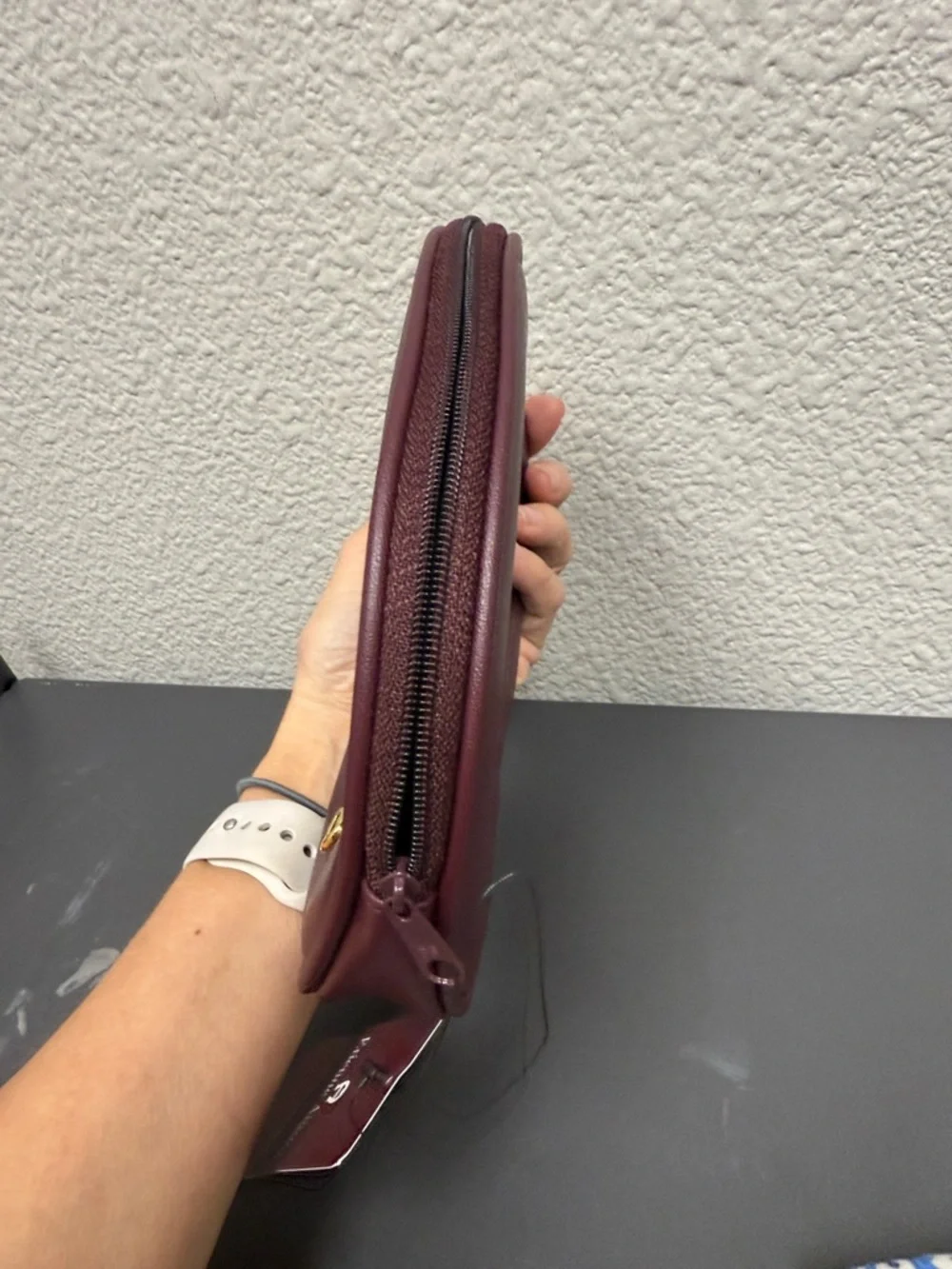 Etienne Aigner emblem smooth